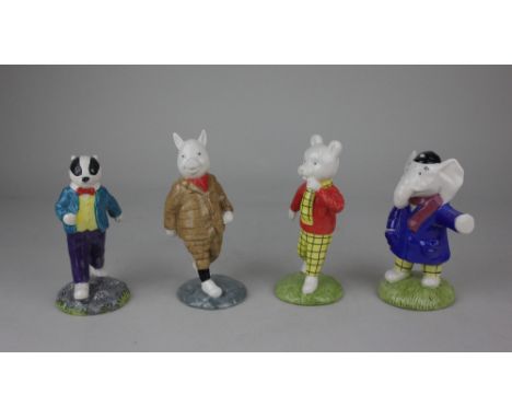 A collection of four Beswick 'Rupert' character figures comprising Rupert Bear, Bill Badger, Podgy Pig and Edward Trunk, all 