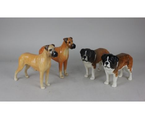 Two Beswick models of St Bernards 'Corna Garth Stroller', white, matt and gloss, each 14cm, together with two Beswick models 