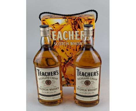 Two one litre bottles of Teacher's Highland Cream Perfection of Old Scotch Whisky, in a twin pack gift box