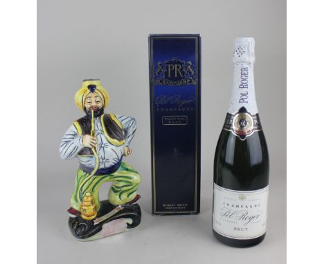 A bottle of Pol Roger White Foil Brut champagne, together with a bottle of Drioli apricot liqueur in a novelty ceramic bottle