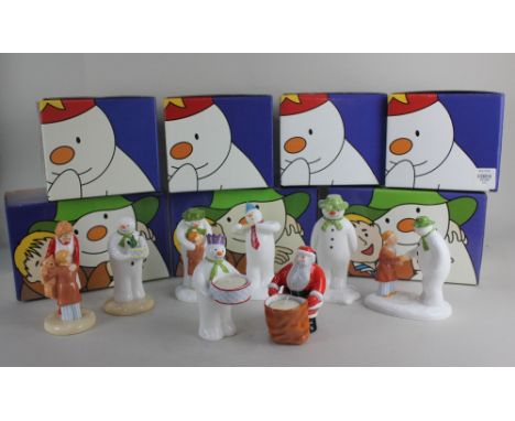 A collection of seven Coalport porcelain 'The Snowman' figures, boxed, to include 'Hug For Mum', 'How Do You Do', a pair of F