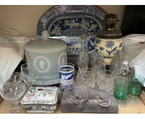 A jasper ware cheese dish and cover together with a blue and white pottery meat plate, pottery oil lamp, glasswares etc