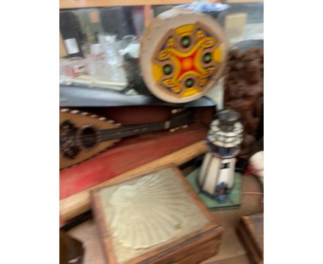 A Guiseppe Casini bowl back mandolin, cased together with drums, boxes and covers, metronome, leaded glass lighthouse table l