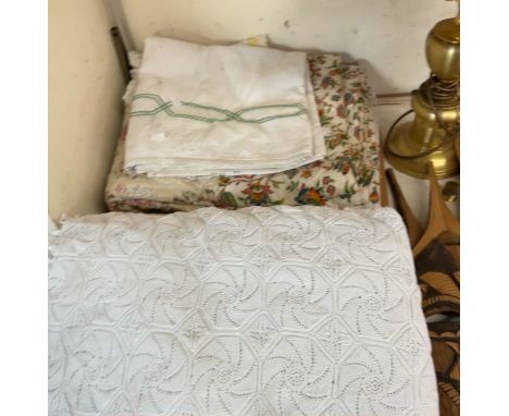 A Bed spread together with a quilt and linen