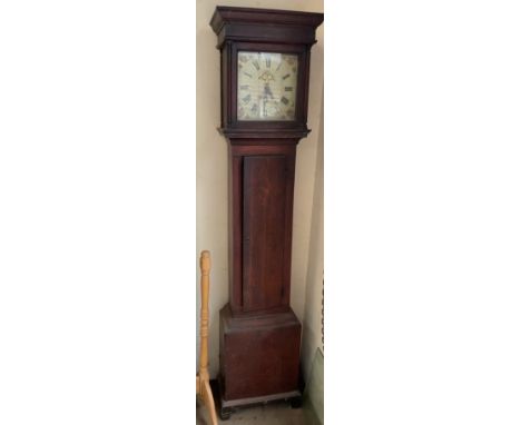 A 19th century oak longcase clock, with a 28cm square dial, with floral spandrels and Roman numerals above a long trunk door,
