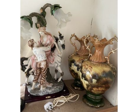 A large resin lamp from the Julian collection depicting a lady and gentleman on a horse, together with three other table lamp