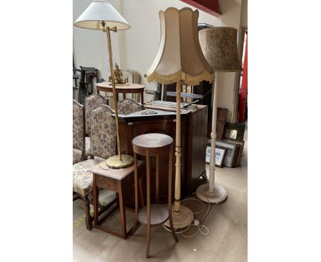 A carved occasional table together with a mahogany jardiniere stand, two painted standard lamps and a brass standard lamp