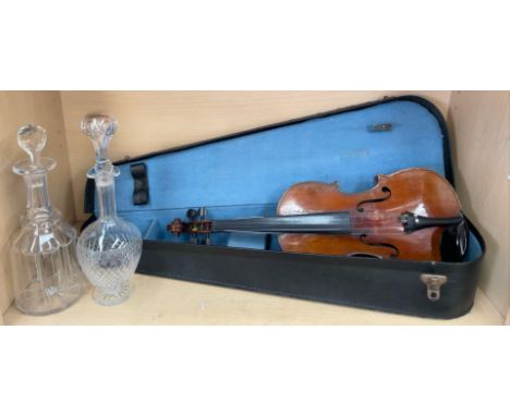 A Fortis and Dulcis violin, with a one piece back and ebonised stringing, 33cm long not including button, overall, 54cm long,