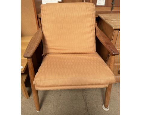 A mid-20th century teak elbow chair CONDITION REPORT: Post 1950’s FurnitureAll furniture manufactured post 1950 included in a