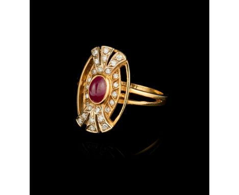 A Ring800/000 goldset with a cabochon cut ruby ​​and 26 brilliant cut diamonds weighing approximately 0.50 ct.Oporto assay ma