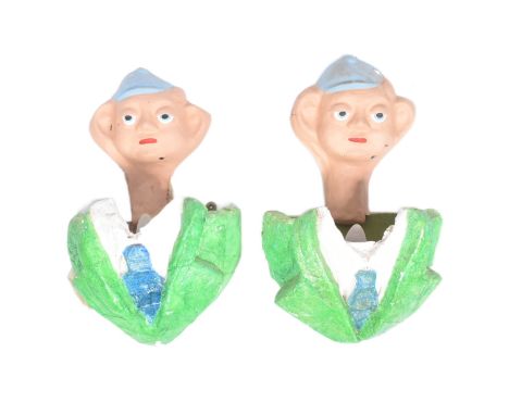 Forkbeard Fantasy - a pair of composite custom-made wall sconce uplighters, featuring a character in lime green schoolboy typ