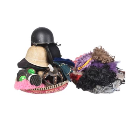 Forkbeard Fantasy - a collection of assorted wigs and costume hats to include: cricket caps, sombrero, gas mask, electric cha