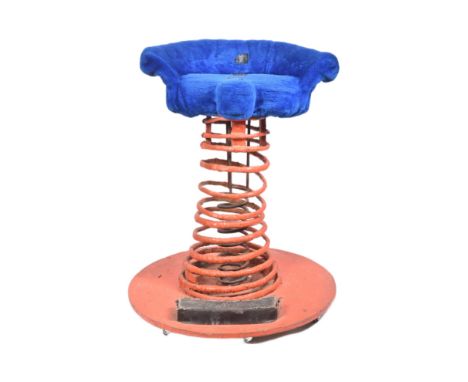 Forkbeard Fantasy - The Barbers of Surreal (1997) - a lifesize spring mounted stool. Comprising blue plush seat mounted atop 