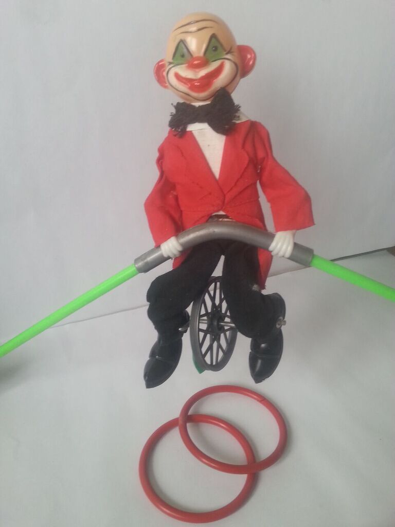 Vintage toy - balancing tightrope clown on unicycle. Needs a very small ...