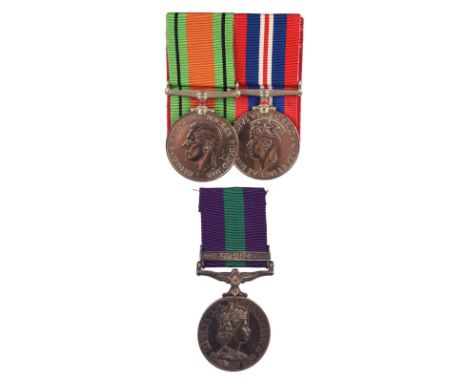 A mounted Second World War medal group comprising Defence Medal and War Medal, a corresponding miniature pair, very fine; a G