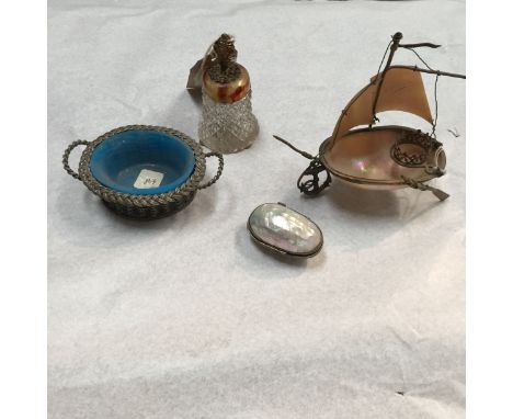 A Shell box, mother of pearl shells in the form of a ship, rope twist white metal basket with blue glass liner and a crystal 