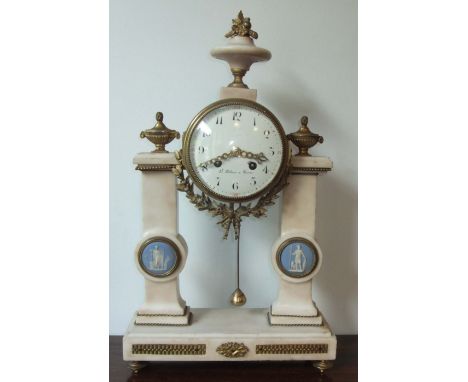 A French Portico mantel clock with marble columns, decorated with blue jasper roundels depicting classical scenes with a roun