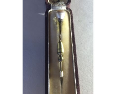A gilt metal top bar pin set with one pearl and two marcosites L 5cm, together with a gilt top bar pin with central twist des