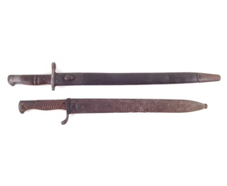 WW1 P14 bayonet, dated 1913, with scabbard stamped HGR17, also a 98/05 bayonet and scabbard, the blade stamped Mauser, (2) th