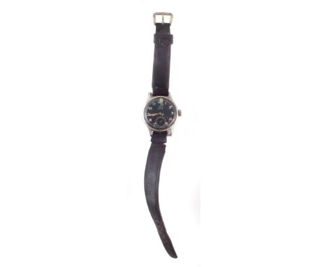Omega military manual wind wrist watch, black face with Arabic numerals, luminous hand and baton markers, seconds dial at 6, 