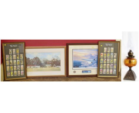 Hero of the sky concord print, Cricket prints, Wills cigarette cards and an oil lamp Condition reports are not available for 