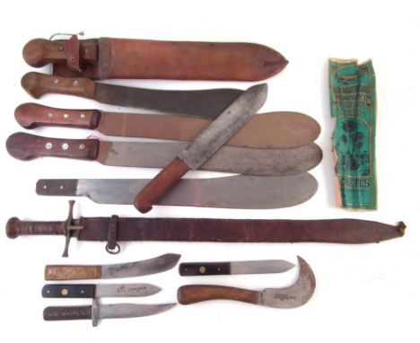 Six machetes, three by Martindale, another by Wilson and one by Robert Mole with Steamer logo, and leather scabbard, also and