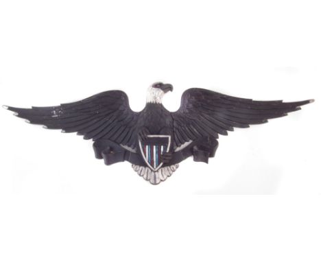 United States Army alloy gate insignia , in the form of an eagle clutching a shield, 102cm wide