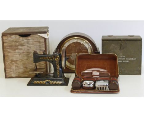DRGM cased toy sewing machine with original instructions, Smiths 8-day mantle clock, Military headgear box etc. Condition rep