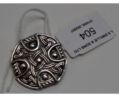 A SCOTTISH STERLING SILVER BROOCH PIN MODELLED AS A CELTIC SHIELD BY ROBERT ALLISON     