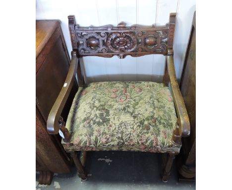 A 1920's carved walnut side chair with tapestry seat