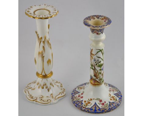 An early 20th century Copeland & Garrett glazed ceramic candlestick with handpainted floral decoration, H. 20cm, together wit