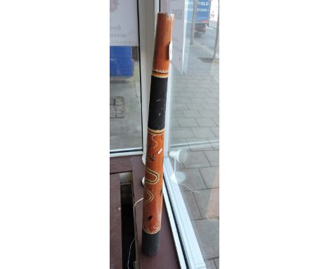 A 20th Century didgeridoo, with instruction manual