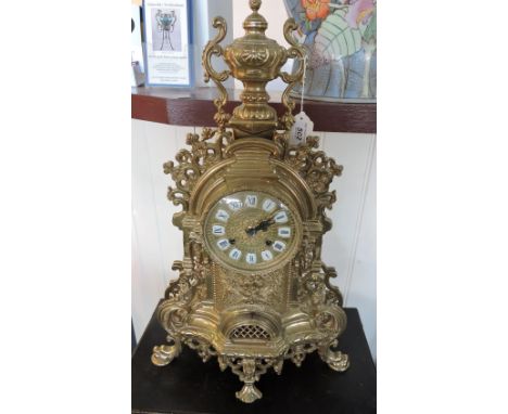 A 20th Century Italian cast brass bracket clock with enamel tablet numerals
