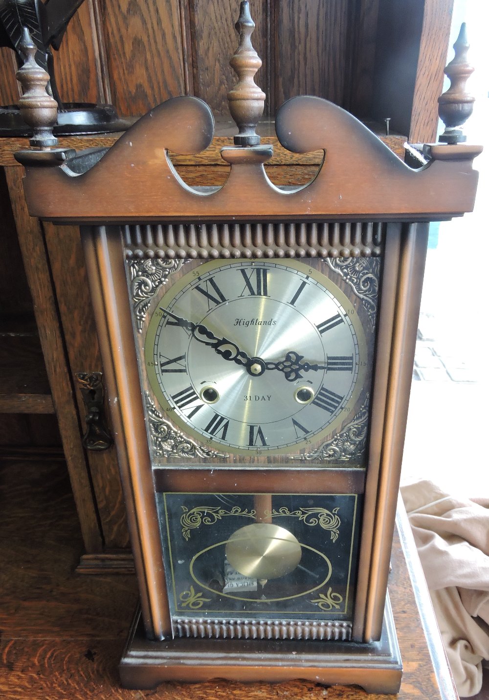 A modern Highlands 31 day wall clock