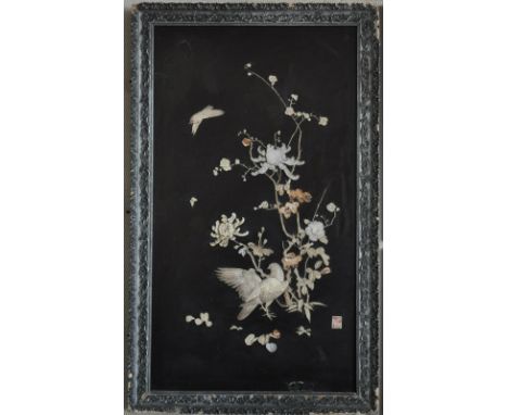 An early 20th Century Chinese Shibayama panel, with inlaid carved bone decoration, in wood and gesso frame, bears seal mark, 