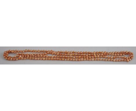 A string of light brown baroque freshwater pearls