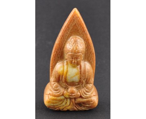 A small Chinese jade Buddha carving