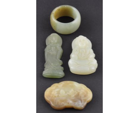 Three Chinese jade carvings together with a jade ring 