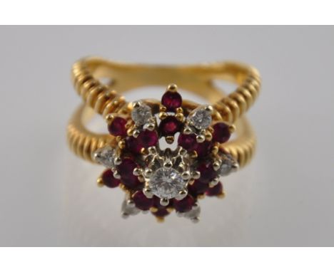 A 14ct gold ruby and diamond cluster ring 