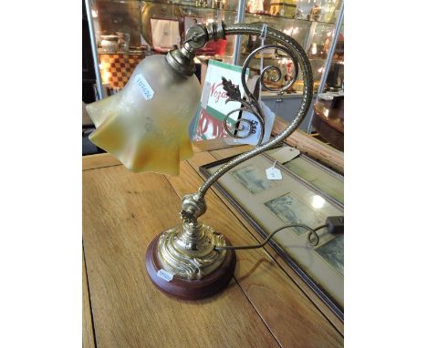 A Victorian brass gas lamp with yellow tinged etched glass shade, converted to electricity
