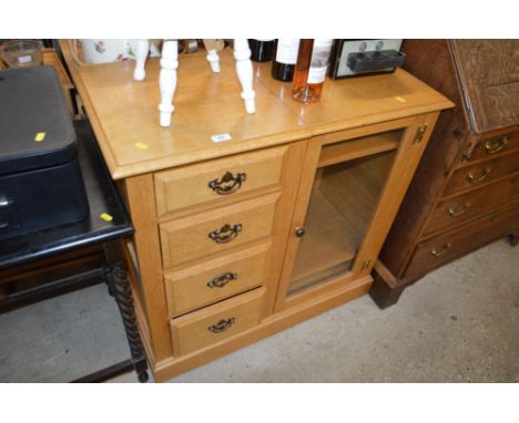 A Titchmarsh &amp; Goodwin light oak hifi cabinet fitted four drawers