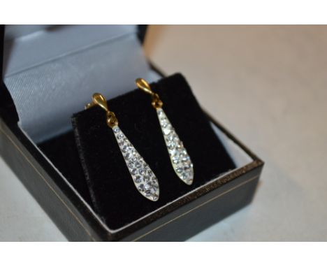 A pair of 9 carat gold and white stone set drop earrings