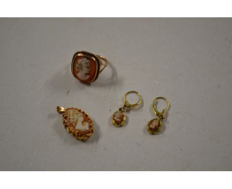 A 9 carat gold cameo ring; a 9 carat gold mounted and cameo pendant and a pair of earrings