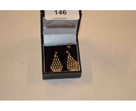 A pair of 9 carat gold earrings 