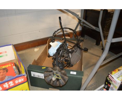 An Art Deco wrought iron hanging pendant light fitting 