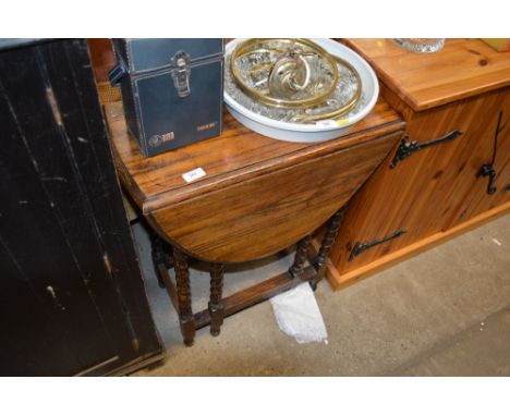 A small oak barley twist gate leg table 