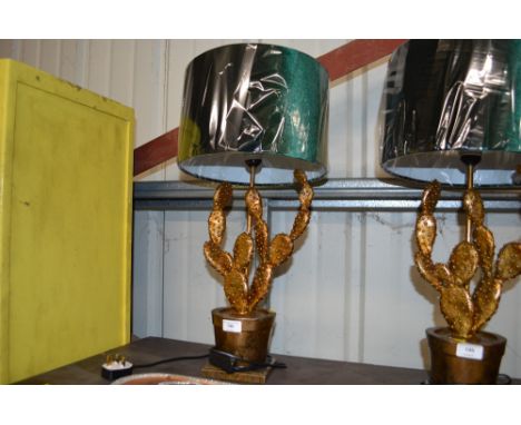A novelty table lamp in the form of a cactus 