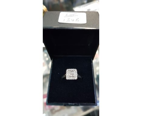 9 CARAT WHITE GOLD DIAMOND RING WITH JUST OVER HALF A CARAT OF DIAMONDS