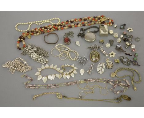 A collection of costume jewellery, including an Ingersoll Eclipse open faced pocket watch with black enamel dial and silver w