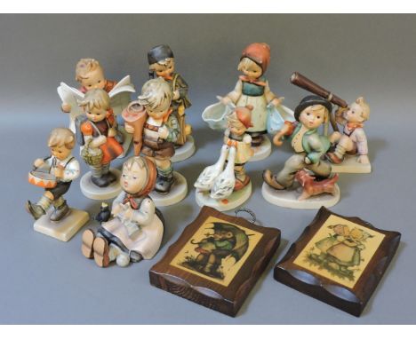 Ten various Hummel figures, including Telescope, Chimney Sweep, School Children, etc, and two wooden plaques